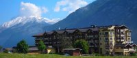 Hotel with snow on mountains